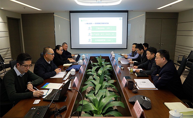 熊良虎会见中建材（北京）EVO厅公司董事长泥卫东